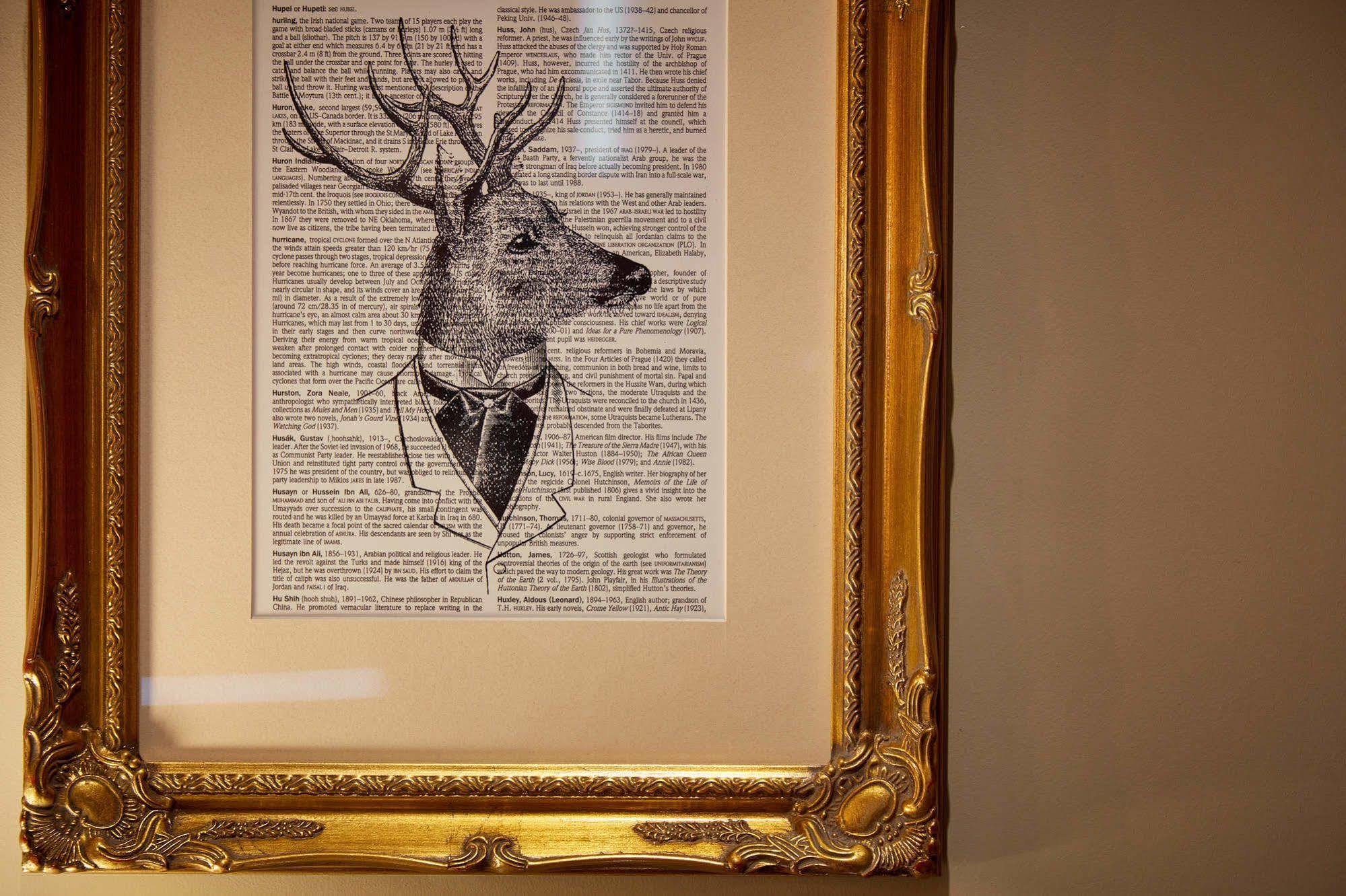 Oddfellows On The Park Cheadle  Exteriör bild A framed print of a deer head with a bow tie